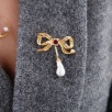 Handmade Design Silver Brooch Baroque Pearl with Ribbon Design